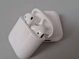 two airpods that are sitting on top of each other