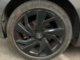 a close up of a tire on a car ' s rim
