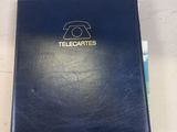 an image of a blue box with a telephone on top of it
