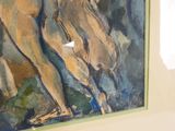 une image d'un tableau sur le mur d'une pièce