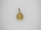 une pièce d'or à l'effigie de Jésus
