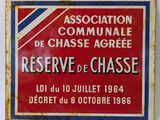 a sign on the wall that says association communale de chasse agree reserve de chasse