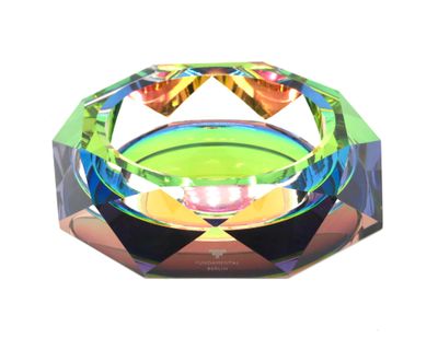 a glass bowl with a colorful design on it