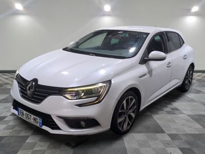 a white car parked in a room with a checkered floor