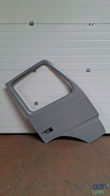 a picture of a car door with a window missing