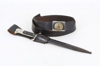 a leather belt with a metal buckle and a leather belt with a metal buckle