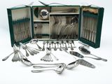 many spoons and forks in a green case