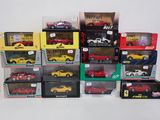a lot of toy cars in boxes on the table