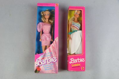 barbie doll in a pink box and a barbie doll in a pink box