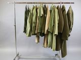 a rack with a bunch of shirts hanging on it
