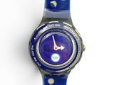 an image of a close up of a wrist watch on a white surface