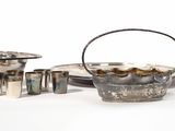 a lot of silver items that are on the table