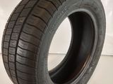 a close up of a tire on a white surface