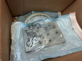 a box with a bunch of screws and nuts in it