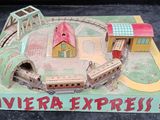a model of a train station with a train on it