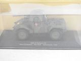 a plastic display case with a toy army vehicle in it