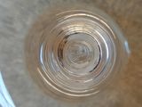 a close up view of a glass of water on a table