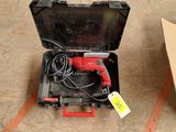 a box with a corded drill and a box with a corded drill