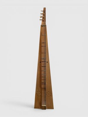 une image représentant un instrument en bois sur fond blanc