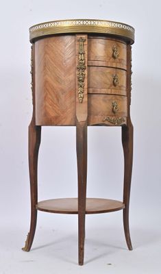 an image of a wooden table with drawers and a shelf