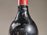 a bottle of wine that is sitting on a table