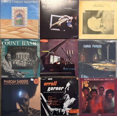 a lot of records that are on the floor