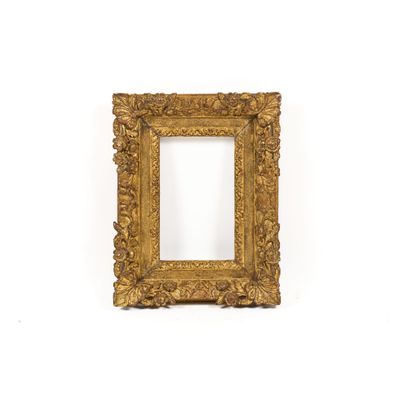 an old gold frame with a white background and a white wall