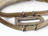 beige leather belt with silver buckle and metal clasp