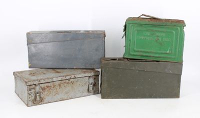 three old metal boxes stacked on top of each other