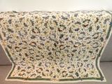 an image of a blanket on a couch in a living room