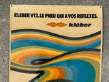 a sign on the side of a building that says kilber y ' lle pleu ou avos reflexes kilber