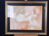 painting of a nude woman in a gold frame on a black background