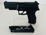 a gun that is sitting on top of a table