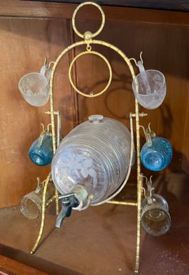 a display case with a bunch of glass vases on it