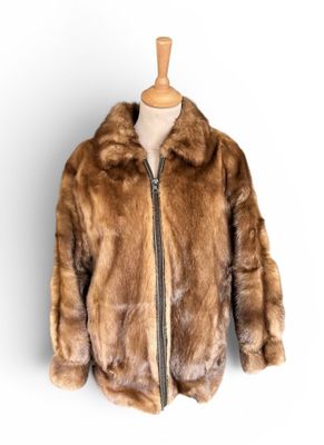an image of a fur jacket on a mannequin