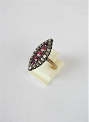 a close up of a ring on a white surface