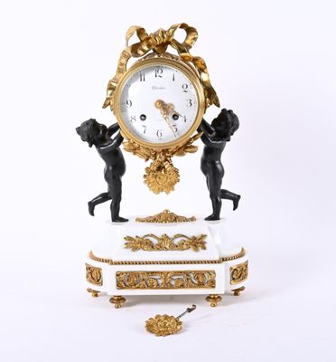 a clock that is sitting on top of a table