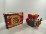 a small toy engine and a box on a table