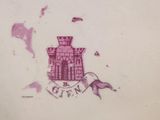 a picture of a plate with a castle on it