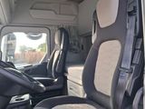 the interior of a van with two seats and a steering wheel