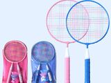 three tennis rackets that are sitting next to each other
