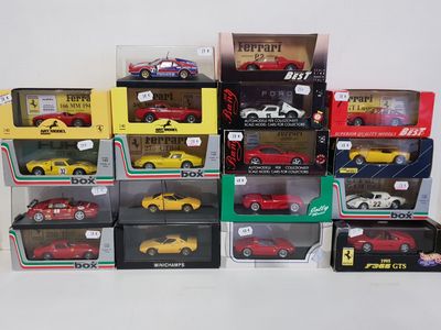 a lot of toy cars in boxes on the table