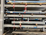 several pallets of wood are stacked on top of each other in a warehouse
