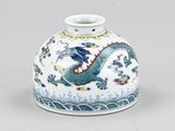 chinese blue and white vase with a dragon design on it