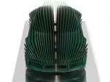 a book sculpture made out of green folded paper