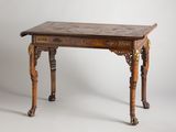 a small table with a wooden top on a white background