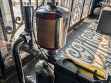 an image of a water heater on the outside of a building
