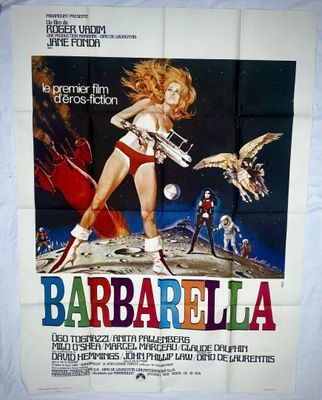l'affiche du film « Barbarella », mettant en scène une femme armée d'un pistolet