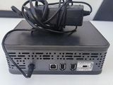 an image of a computer with a power cord plugged into it