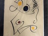 an image of a drawing of a face on a piece of paper